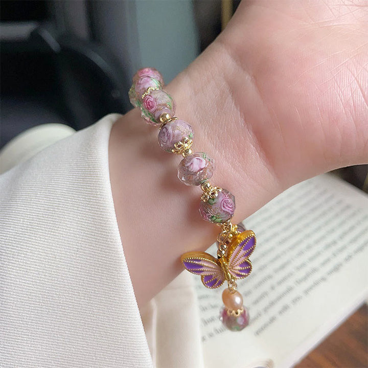 Pulsera de amor con cuentas de cristal Liuli y flores con dijes de mariposas dobles de Buddha Stones - image 4