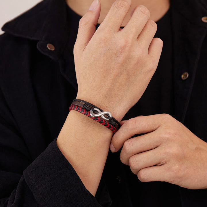 Pulsera de equilibrio de cuero trenzado de tres capas de acero y titanio con diseño infinito de Buddha Stones - image 12