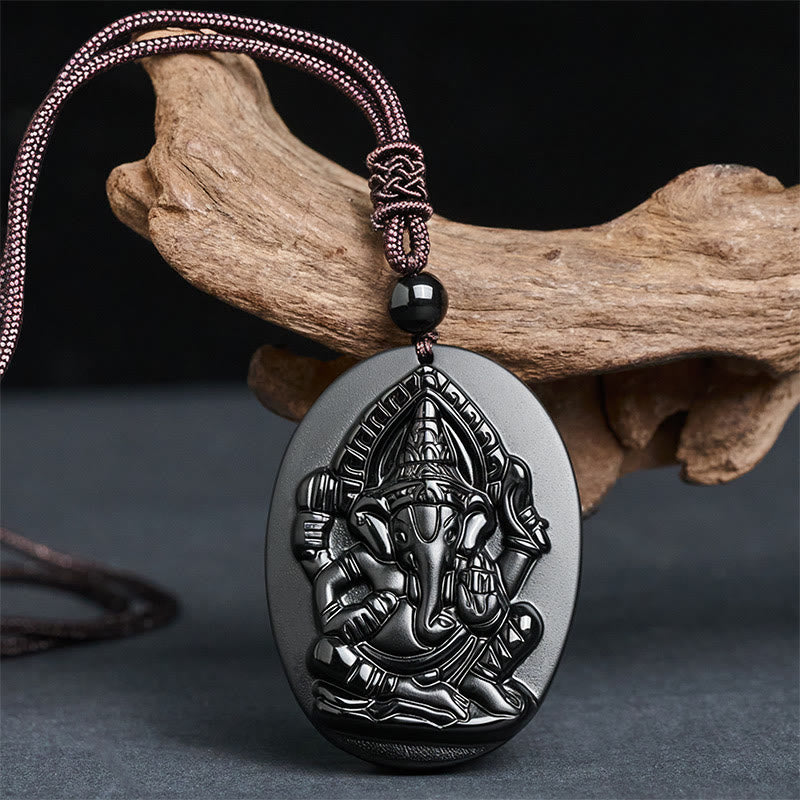 Collar con colgante de obsidiana negra natural con diseño de elefante Ganesh y Buddha Stones. - image 1