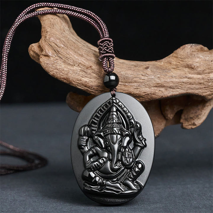 Collar con colgante de obsidiana negra natural con diseño de elefante Ganesh y Buddha Stones. - image 1