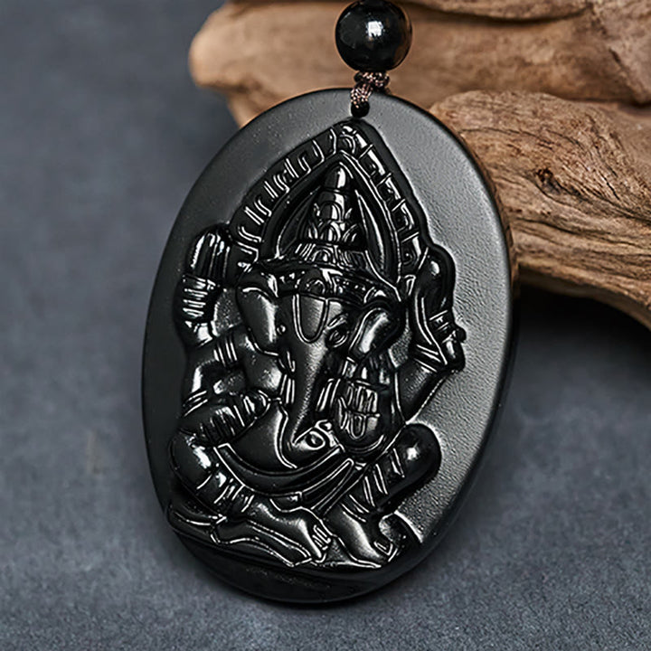 Collar con colgante de obsidiana negra natural con diseño de elefante Ganesh y Buddha Stones. - image 3