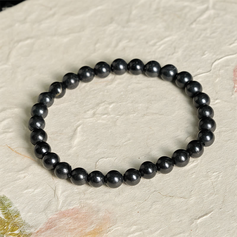 Pulsera de cuentas de shungita auténtica y redonda con Buddha Stones y fuerza interior - 6 mm - image 1