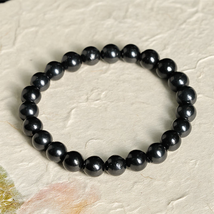 Pulsera de cuentas de shungita auténtica y redonda con Buddha Stones y fuerza interior - 8 mm - image 7