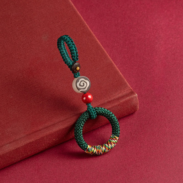 Buddha Stones tejidas a mano con hilo colorido y hebilla de marfil y cinabrio para colgar en el teléfono. - Llavero verde - image 1
