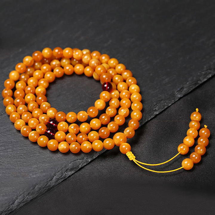 Mala de cuentas redondas de ámbar tibetano con Buddha Stones - 8 mm - image 3