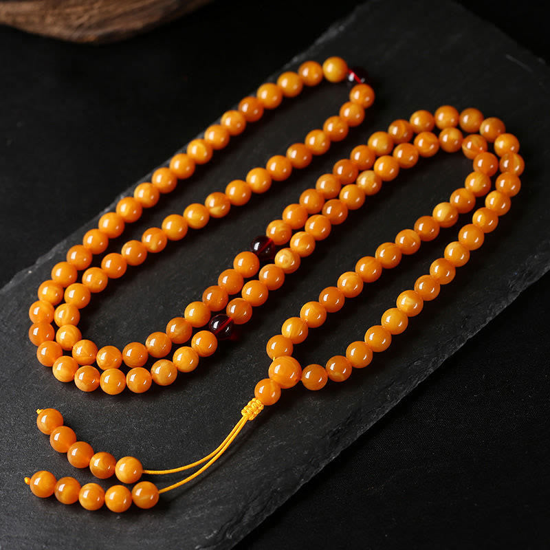 Mala de cuentas redondas de ámbar tibetano con Buddha Stones - image 4