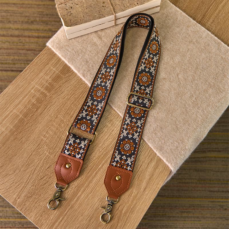 Bolsos de mano ajustables con diseño de flores marrones y Buddha Stones, con correas cruzadas para el hombro. - image 1