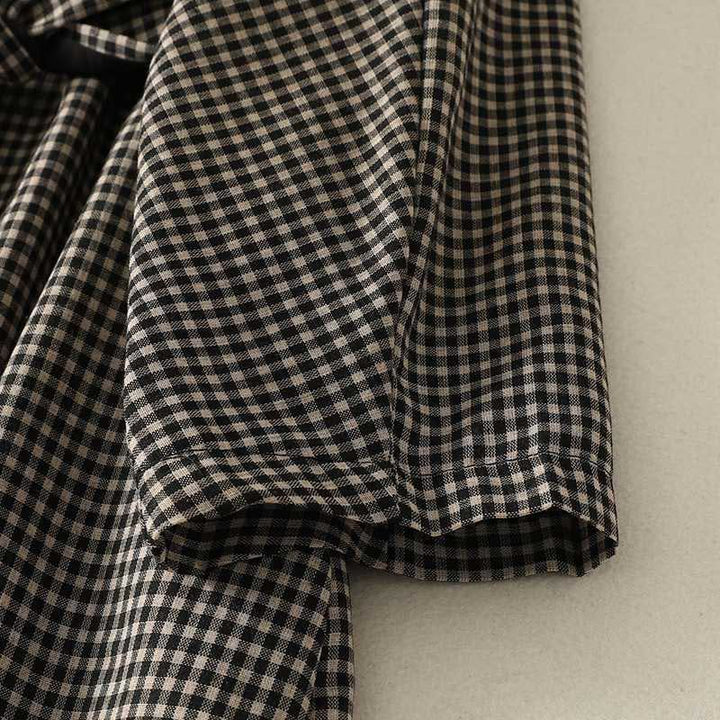 Vestido midi de manga larga con cuello alto, cordones y bolsillos, diseño a cuadros blancos y negros de Buddha Stones Fall - image 6