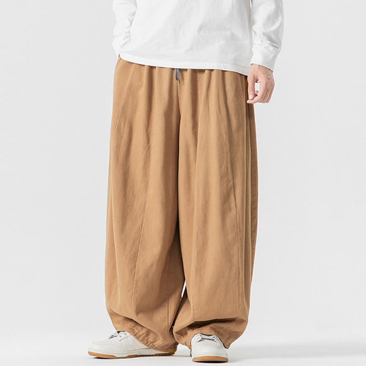 Pantalones de algodón de pierna ancha con bolsillos para hombre, diseño de cordón liso, estilo viajero invernal Buddha Stones - image 9