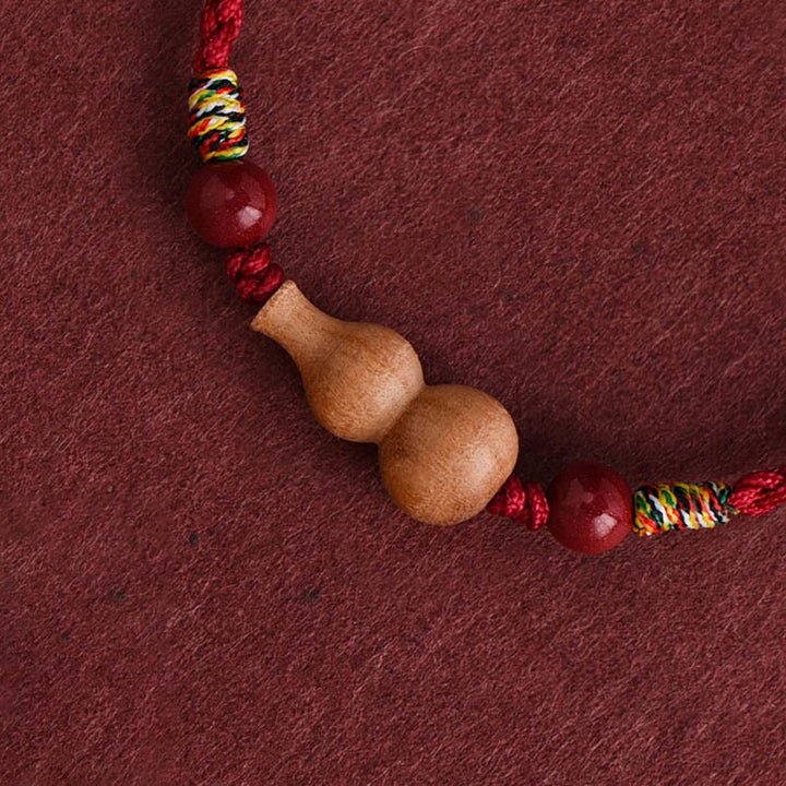 Pulsera ajustable de madera de melocotón con Buddha Stones y calabaza para la riqueza y la suerte - image 1