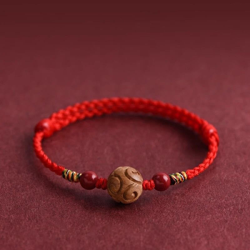 Pulsera de cuerda de madera de melocotón natural con Buddha Stones talladas y patrón auspicioso - image 0
