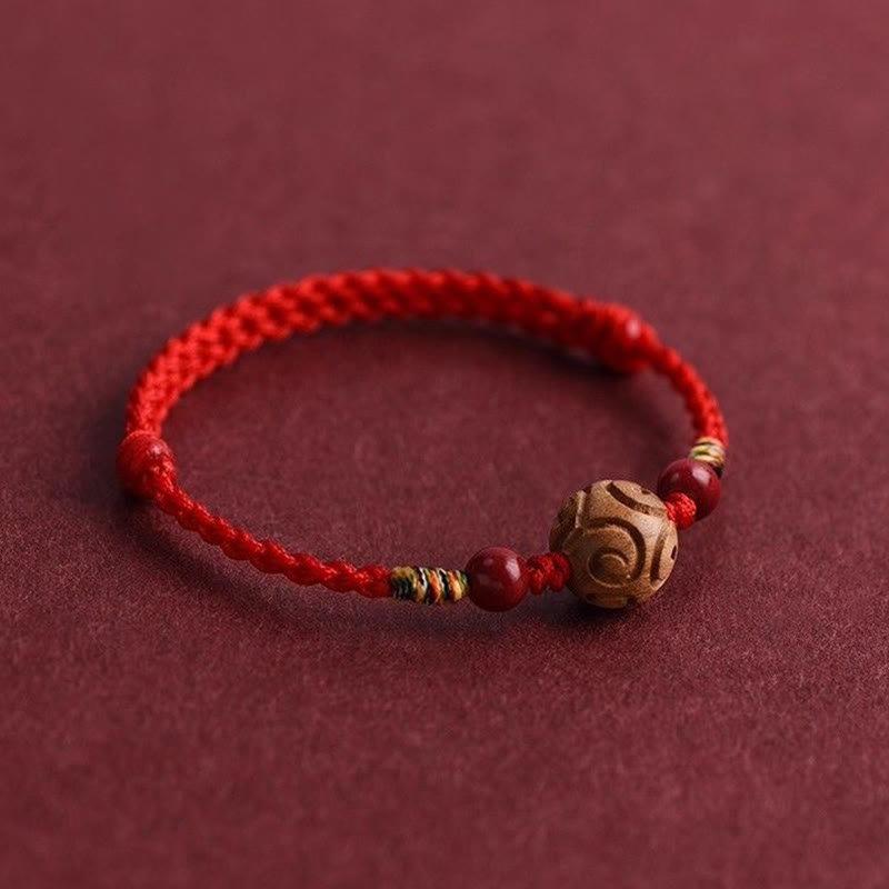 Pulsera de cuerda de madera de melocotón natural con Buddha Stones talladas y patrón auspicioso - image 2