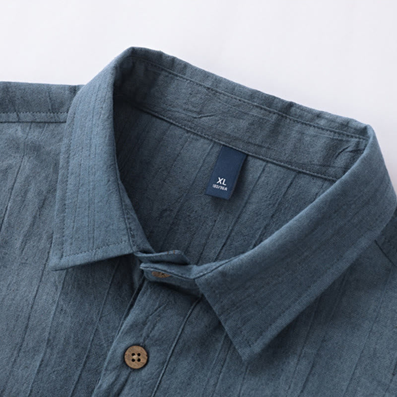 Camisa de algodón y ramio de manga corta con diseño plisado liso de verano para hombre con medio botón y diseño de Buddha Stones - image 1