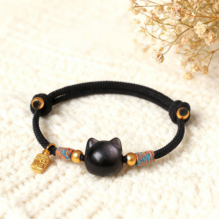 Buddha Stones Pulsera protectora de hilo de cristal rosa obsidiana con brillo plateado y personaje de Cat Fu - Cuerda negra de obsidiana con brillo plateado (circunferencia de la muñeca: 15-18 cm) - image 0