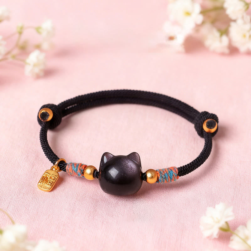 Buddha Stones Pulsera protectora de hilo de cristal rosa obsidiana con brillo plateado y personaje de Cat Fu - image 1
