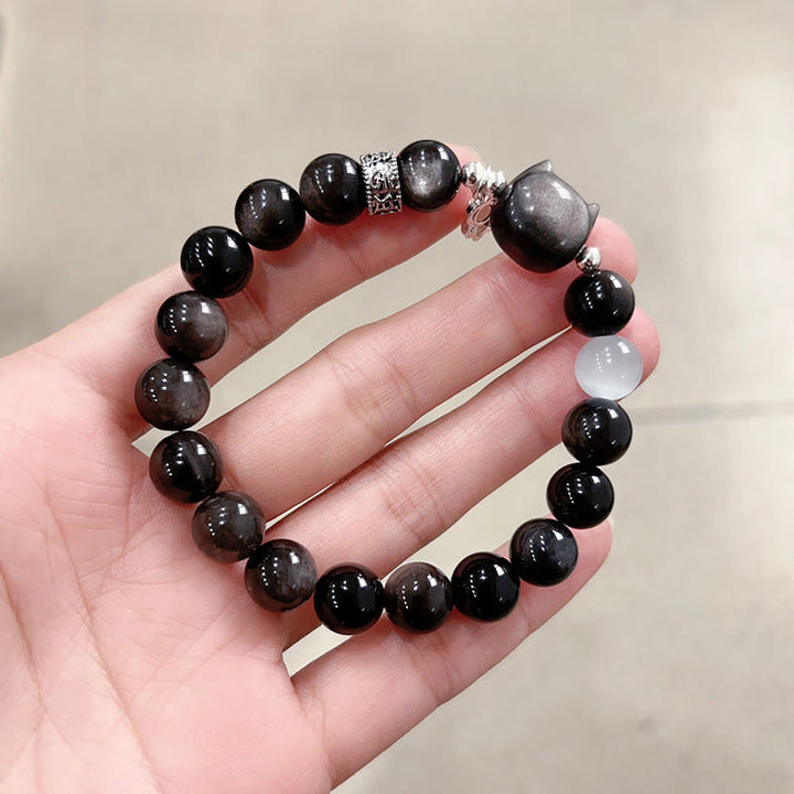 Buddha Stones Pulsera positiva de obsidiana plateada con brillo de ojo de gato blanco y cabeza de gato - Cuenta de obsidiana plateada brillante, tamaño 10 mm (circunferencia de la muñeca: 14-15 cm) - image 14