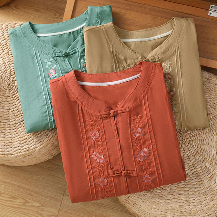 Camisa de mujer con cuello alto, botones de rana y flores bordadas, puños elásticos y manga tres cuartos con diseño de Buddha Stones - image 21