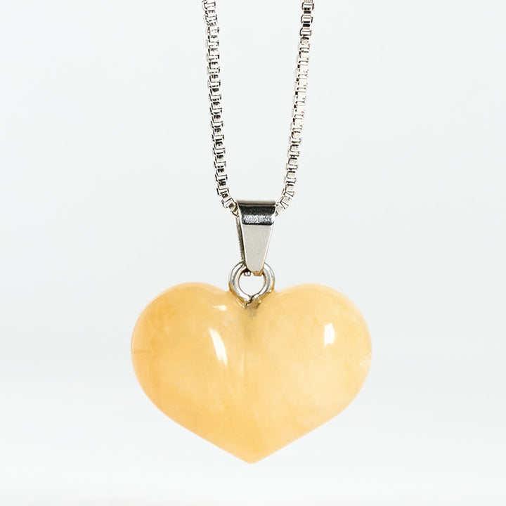 Colgante de equilibrio con Buddha Stones, diseño de corazón, amatista, topacio, cristal rosa, ópalo, ojo de tigre, cristal blanco, jaspe rojo, amazonita, aventurina verde, obsidiana negra, citrino. - Topacio - image 5