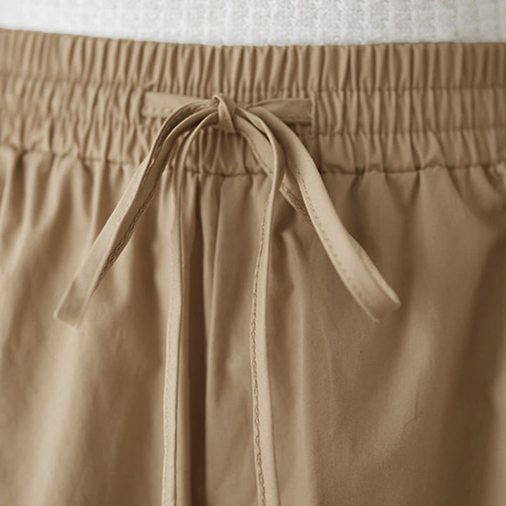 Buddha Stones Pantalones capri de pierna ancha para mujer con diseño abotonado lateral liso y bolsillos - image 22