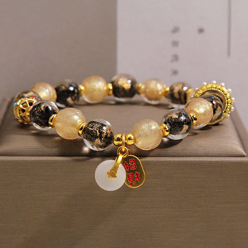 Buddha Stones Pulsera de bendición con hebilla de paz y cuentas de vidrio Liuli de oro negro que atrae la riqueza - 14-16 cm - image 0