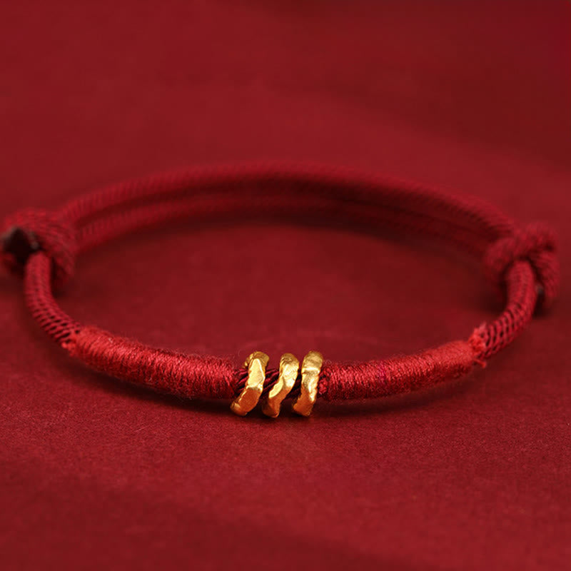 Buddha Stones Pulsera de tobillo trenzada de cuerda roja de la suerte hecha a mano con diseño de anillo de oro 999 - image 1