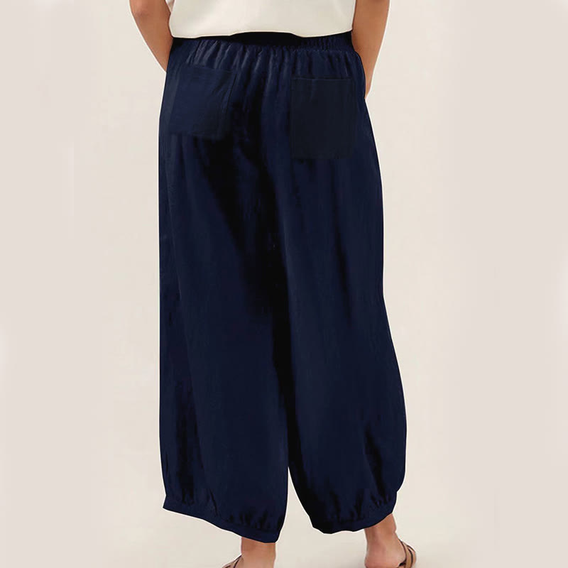 Pantalones harén para mujer con bolsillos y diseño de Buddha Stones en color liso - image 1