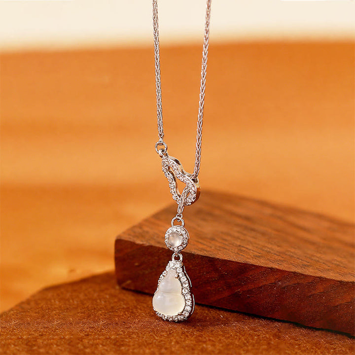 Buddha Stones Colgante de collar con forma de calabaza doble, calcedonia y cobre. - Calcedonia (Armonía positiva ♥) - image 1