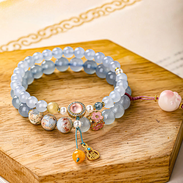 Buddha Stones Pulsera curativa con forma de pata de gato y calcedonia azul Fu - Huella de gato (circunferencia de la muñeca: 14-15 cm) - image 0