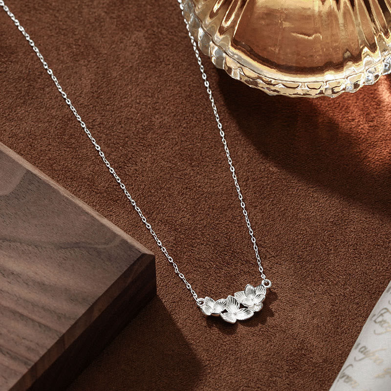 Buddha Stones Colgante de collar con diseño de flor bendita en plata de ley 999 - image 1