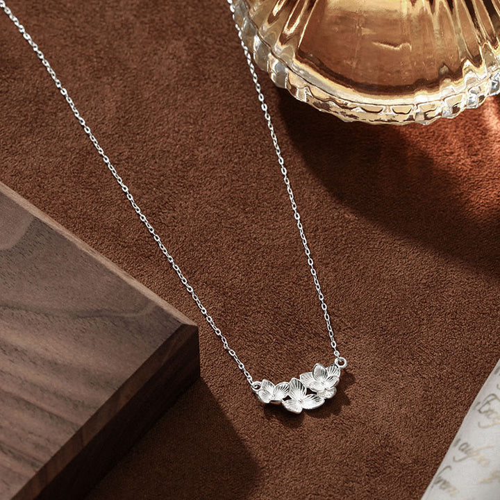 Buddha Stones Colgante de collar con diseño de flor bendita en plata de ley 999 - image 1