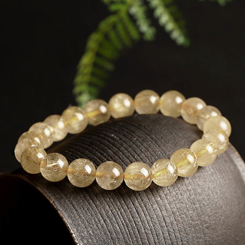 Pulsera de protección de auspiciosidad de cuarzo rutilado natural con Buddha Stones - Cuarzo rutilado dorado (circunferencia de la muñeca: 14-16,5 cm) - image 0
