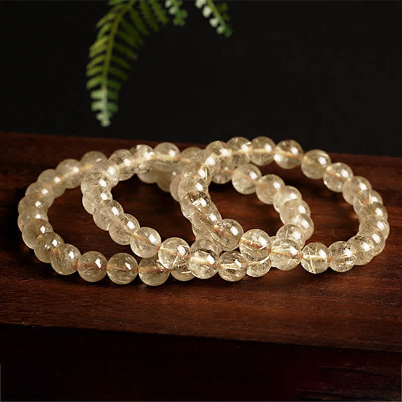 Pulsera de protección de auspiciosidad de cuarzo rutilado natural con Buddha Stones - image 4