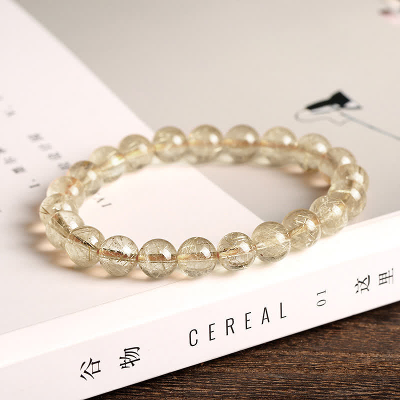 Pulsera de protección de auspiciosidad de cuarzo rutilado natural con Buddha Stones - image 1