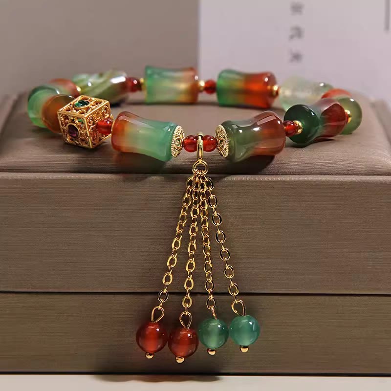 Buddha Stones Pulsera de cuentas de bambú con borla de ágata pavo real colorida - Ágata pavo real (circunferencia de la muñeca: 14-16 cm) - image 0