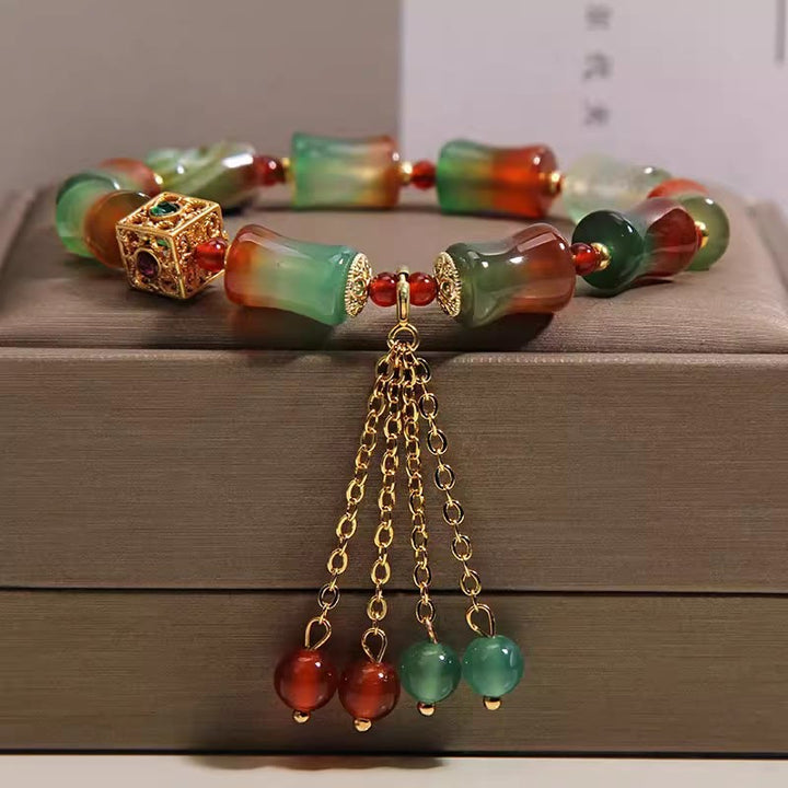 Buddha Stones Pulsera de cuentas de bambú con borla de ágata pavo real colorida - Ágata pavo real (circunferencia de la muñeca: 14-16 cm) - image 0
