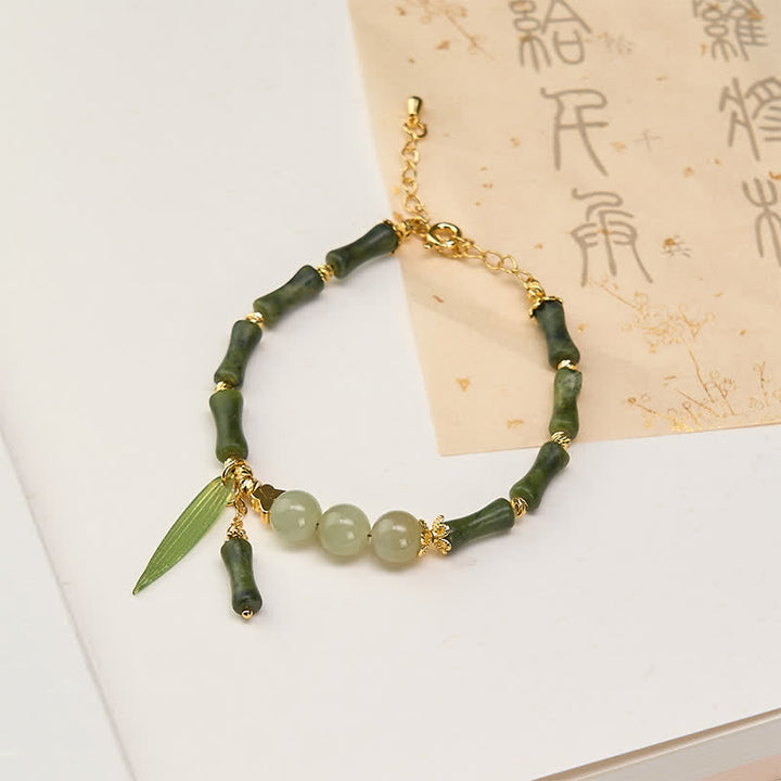 Buddha Stones Pulsera de la paz con cuentas de jade Hetian, peridoto y mariposa de bambú - Peridoto (circunferencia de la muñeca: 15-18 cm) - image 0