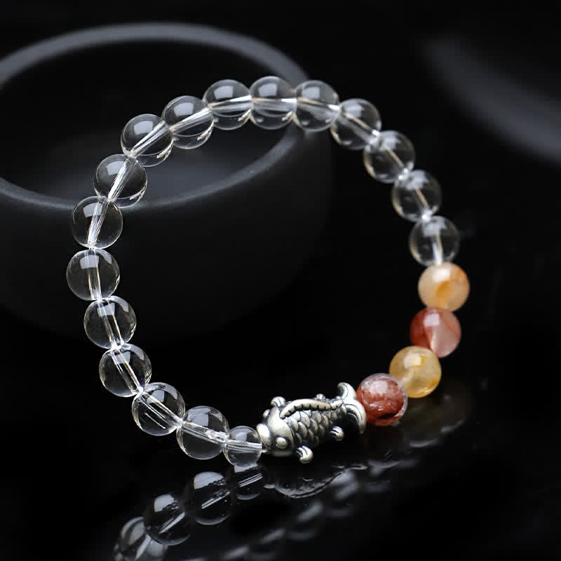 Buddha Stones Pulsera protectora de cuarzo transparente y plata de ley 999 con diseño de pez koi. - image 1