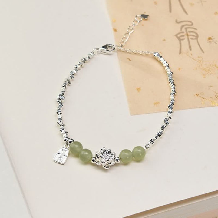 Buddha Stones Pulsera de abundancia con dije de loto, jade y alegría, con cuentas de cobre. - image 1