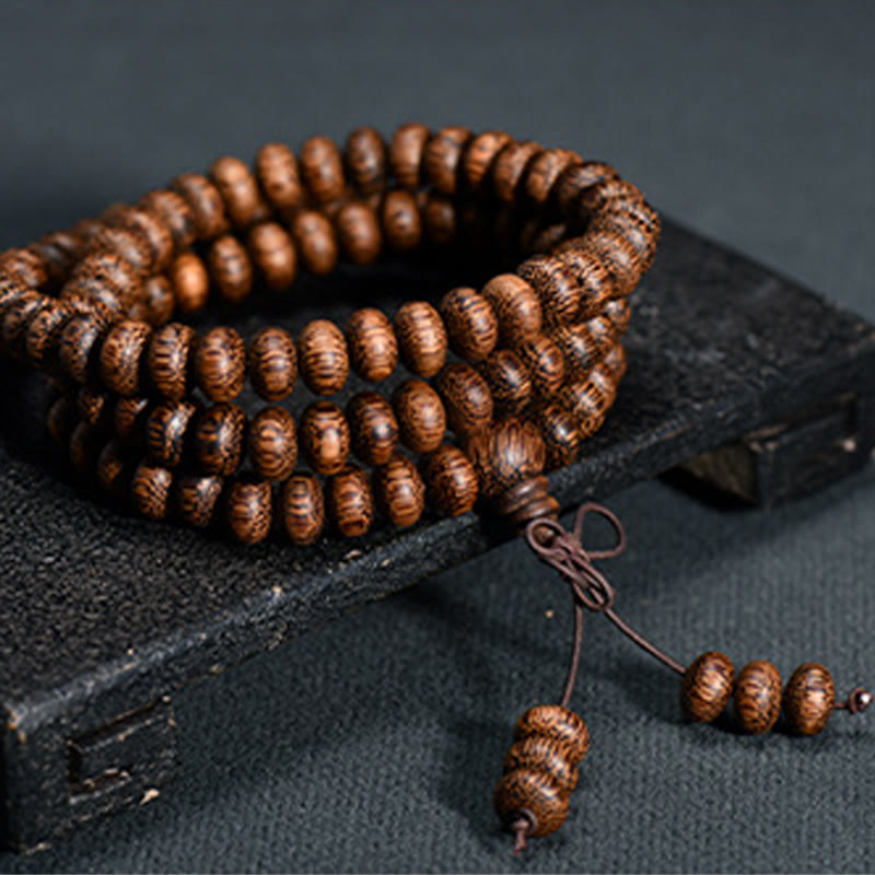 Buddha Stones Mala de 108 cuentas de madera texturizada para una energía tranquila - 6*9mm*108 - image 0