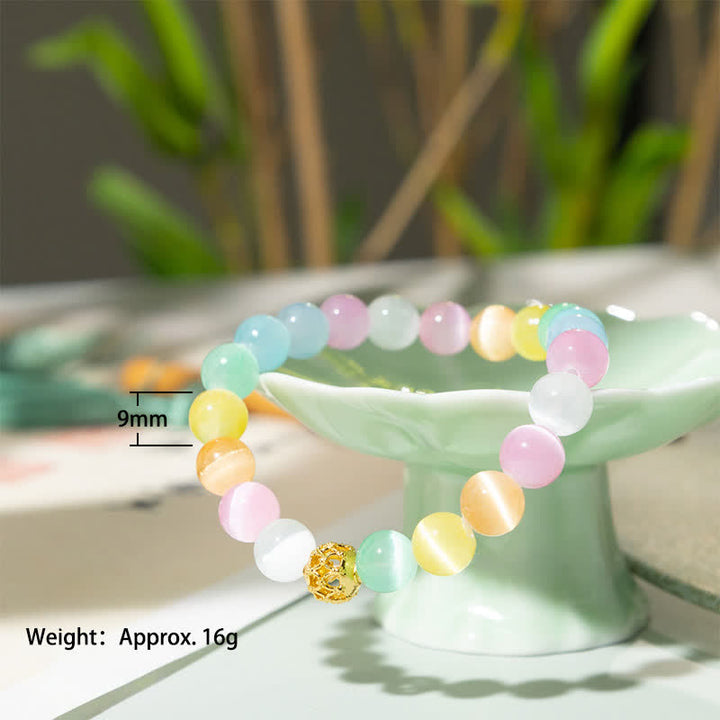 Buddha Stones Pulsera con cuentas redondas multicolores de diseño hueco y forma de ojo de gato. - image 3