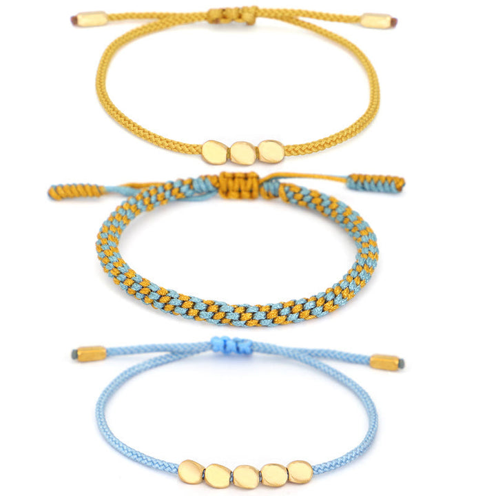 Buddha Stones Pulsera curativa de 3 piezas con cuentas de cobre dorado y hilo azul y amarillo. - image 12