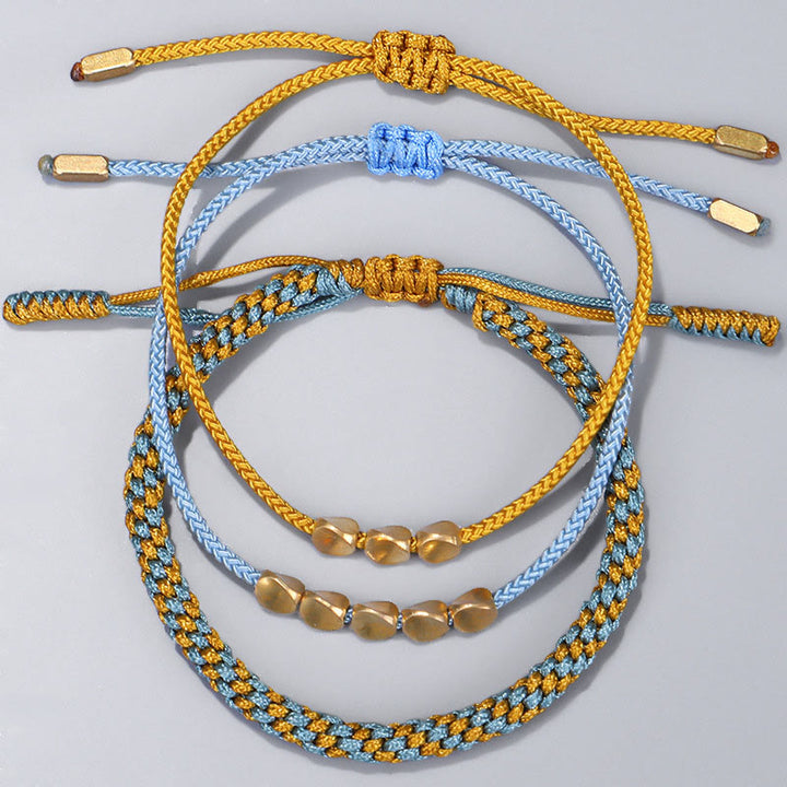 Buddha Stones Pulsera curativa de 3 piezas con cuentas de cobre dorado y hilo azul y amarillo. - image 9