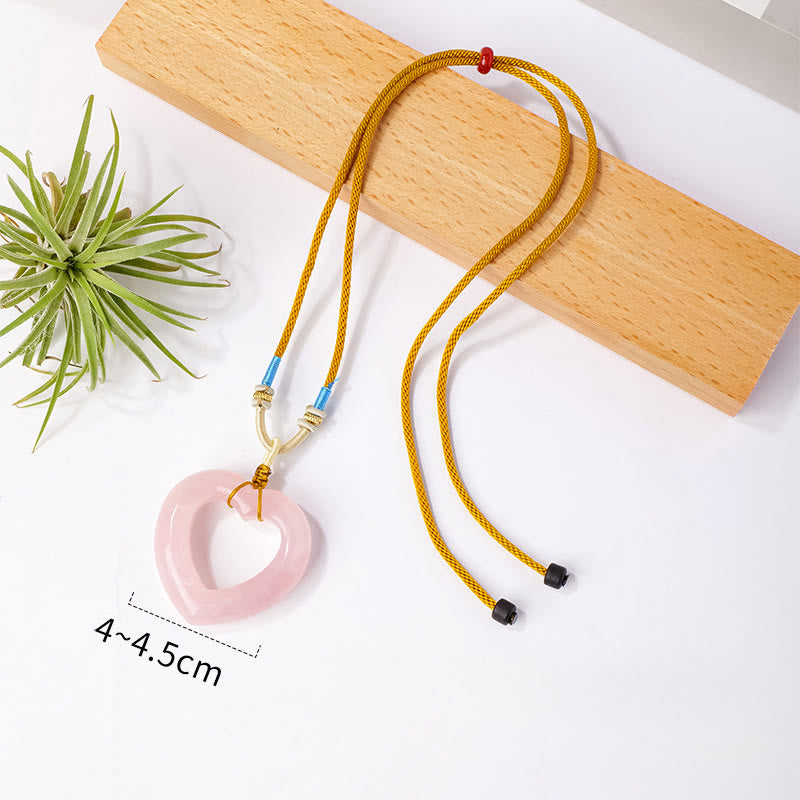 Buddha Stones Collar con colgante de corazón hueco de cuarzo rosa natural. - Cuarzo rosa natural (el color, la forma y el tamaño pueden variar). - image 1
