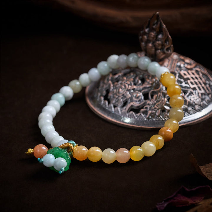 Buddha Stones Pulsera con dije de vaina de loto y hebilla de la paz de jade y cuarcita, que atrae la suerte y la abundancia. - image 1