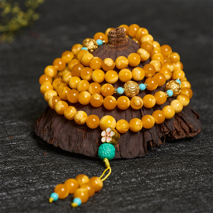 Buddha Stones 108 cuentas de ámbar tibetano Om Mani Padme Hum Mala - image 1