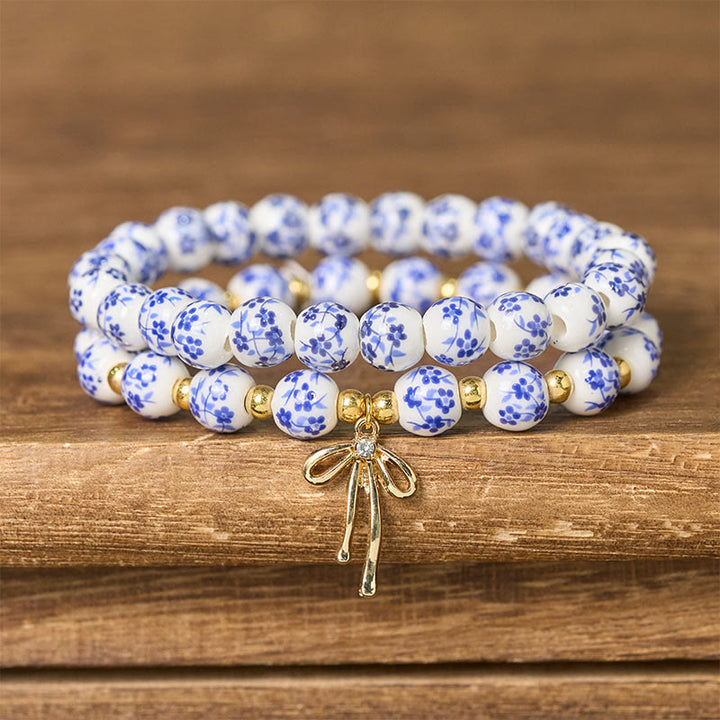 Buddha Stones Pulsera de cuentas de porcelana azul, blanca y rosa con lazo y palabra de honor - Azul y blanco (circunferencia de la muñeca: 15-16 cm) - image 0