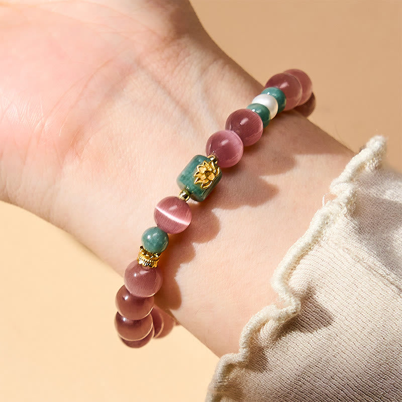 Buddha Stones Pulsera con símbolo de iluminación de loto ojo de gato morado - image 2