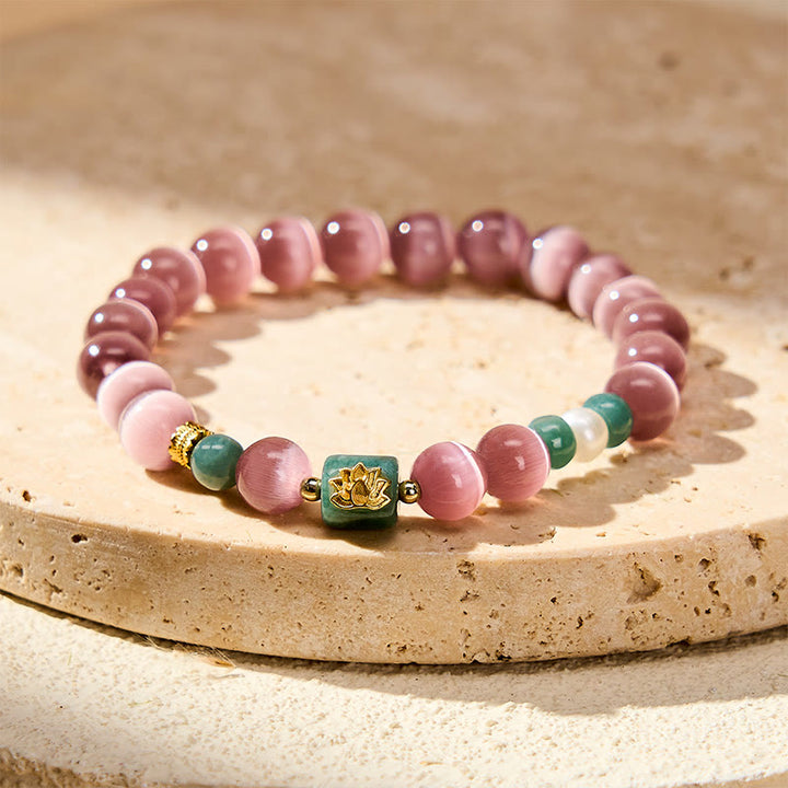 Buddha Stones Pulsera con símbolo de iluminación de loto ojo de gato morado - Ojo de gato morado (circunferencia de la muñeca 15–16 cm) - image 0