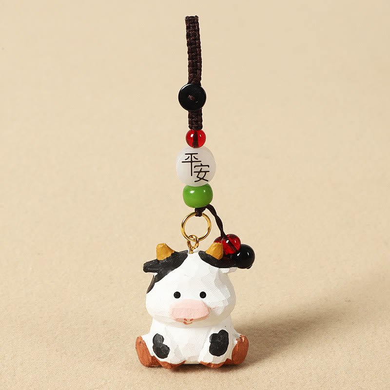 Buddha Stones Llavero chino de madera de tilo con grabado de flor de ciruelo, paz, seguridad, Om Mani Padme Hum positivo - Buey de 4 cm (el color, la forma y el tamaño pueden variar). - Paz y seguridad - image 12