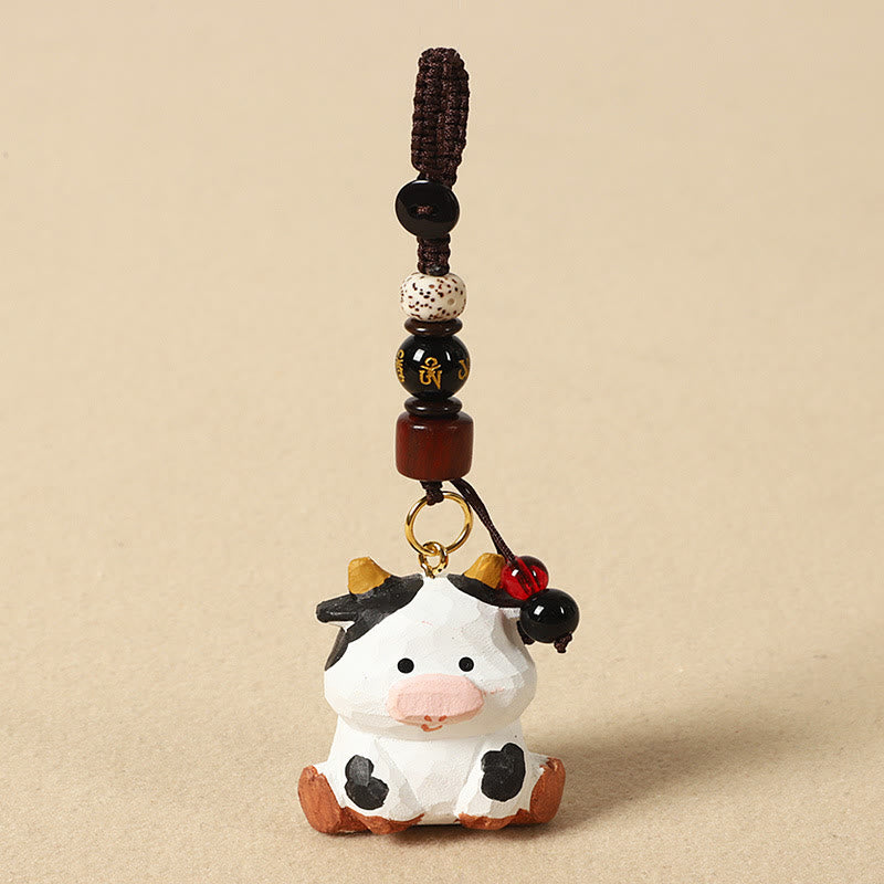 Buddha Stones Llavero chino de madera de tilo con grabado de flor de ciruelo, paz, seguridad, Om Mani Padme Hum positivo - Buey de 4 cm (el color, la forma y el tamaño pueden variar). - Om Mani Padme Hum - image 10
